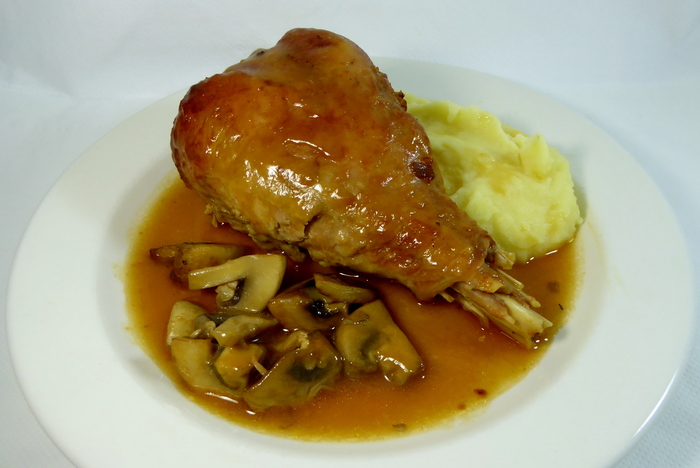Braised turkey thighs with mushrooms and mashed potatoes